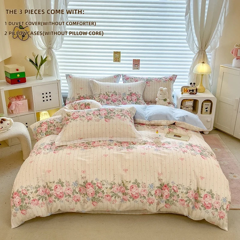 A set of lavender floral bedding includes a duvet cover, two pillowcases, and a pillow core.