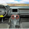 Interior view of a Chevrolet Camaro showing red interior and exterior trim components.