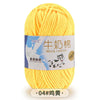 A ball of bright yellow milk cotton blend yarn for knitting and crochet projects.