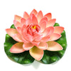 A lifelike floating lotus flower in shades of pink and peach resting on a green leaf.