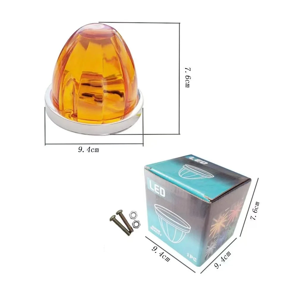 Klares bernsteinfarbiges LED-Warnleuchtsignal mit weißer Basis und Verpackung.
