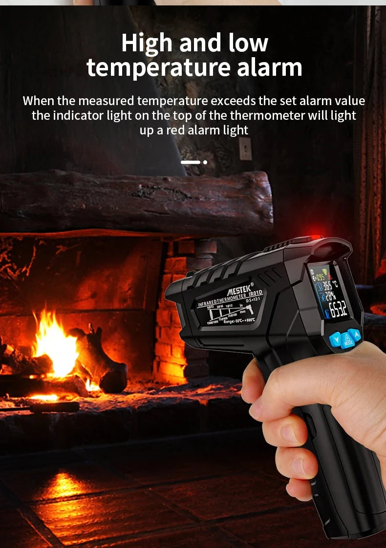 A hand holds a black digital infrared thermometer with a red alarm light, measuring temperature near a fireplace.