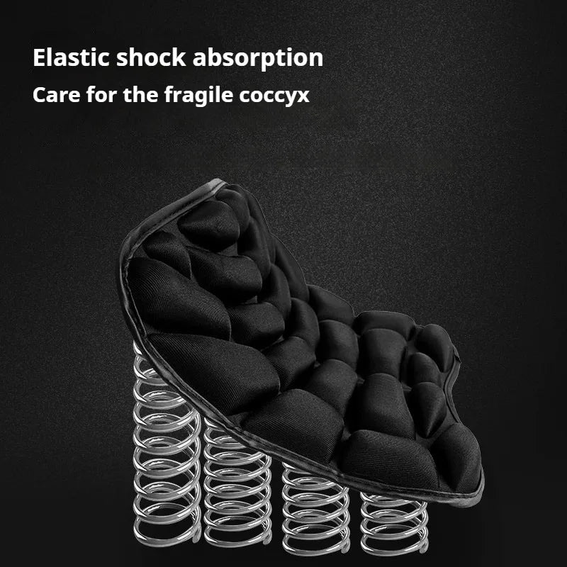 A black ergonomic 3D motorcycle seat cushion with elastic shock absorption features resting on a metal spring base.