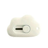A white compact mini cutter with a retractable blade and a round button.