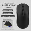 Black AJ139 V2 MC wireless gaming mouse with a magnetic charging base and sensor details.