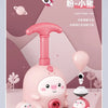 A pink balloon-powered racing car science toy with an air pump and a larger version of the toy.