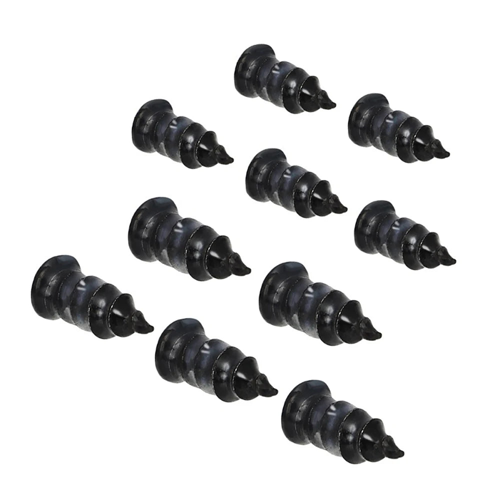 Une collection de clous universels pour réparer des pneus noirs.