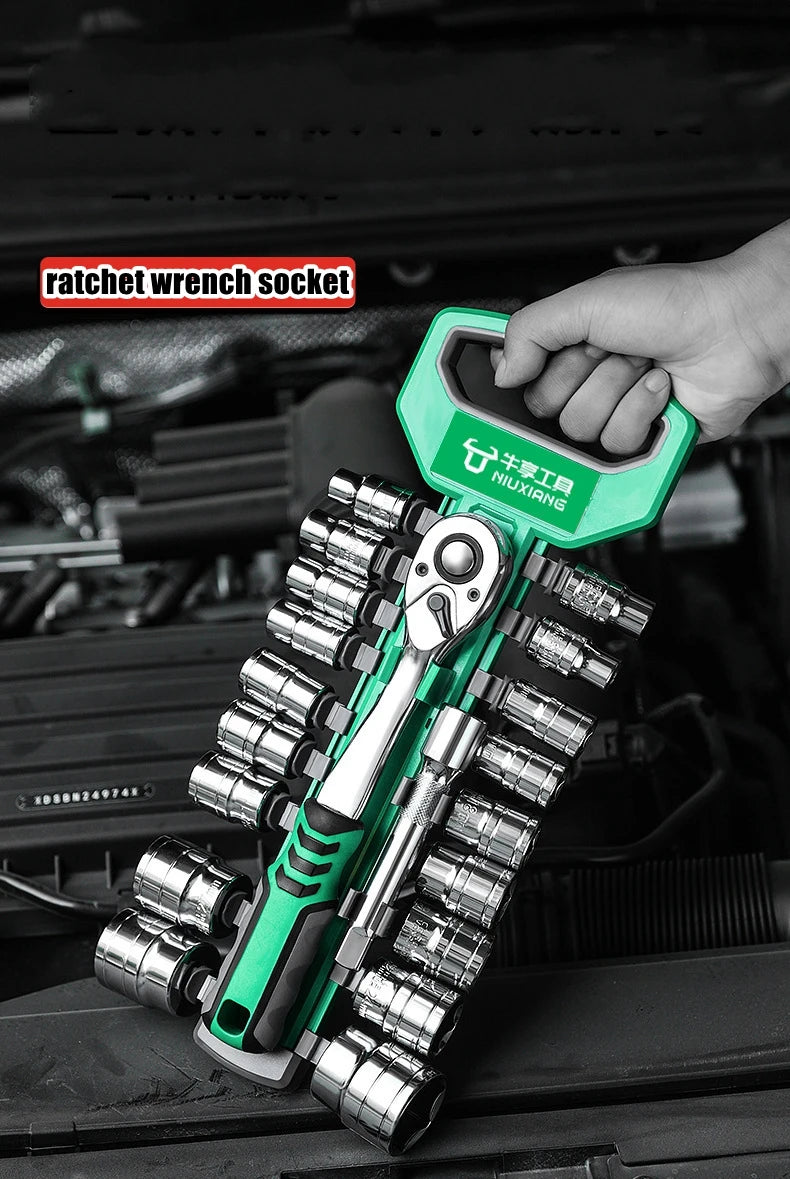 A hand holds a green ratchet wrench socket set with quick-release features against a dark background.