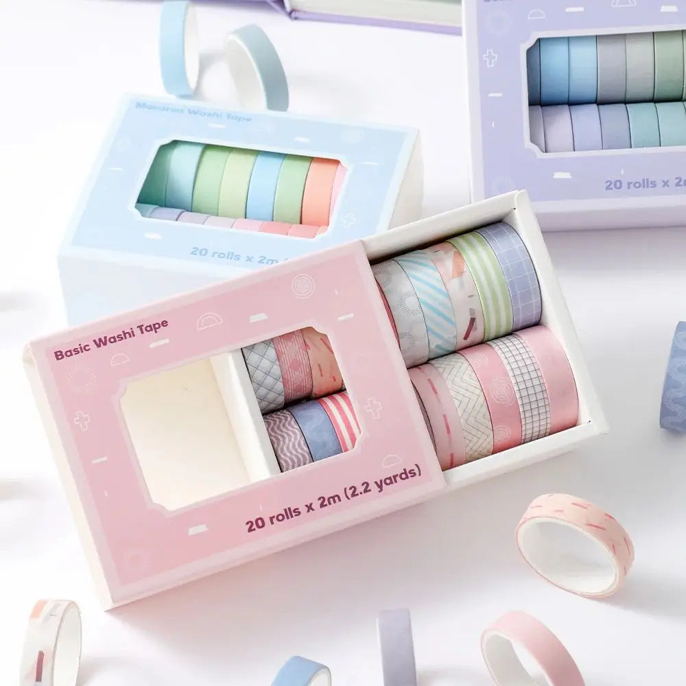 A pink box of 20 rolls of colorful washi tape is shown with some loose rolls on a white surface.