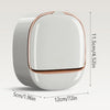 A white waterproof hanging soap holder with a copper rim shown from the side and top view.