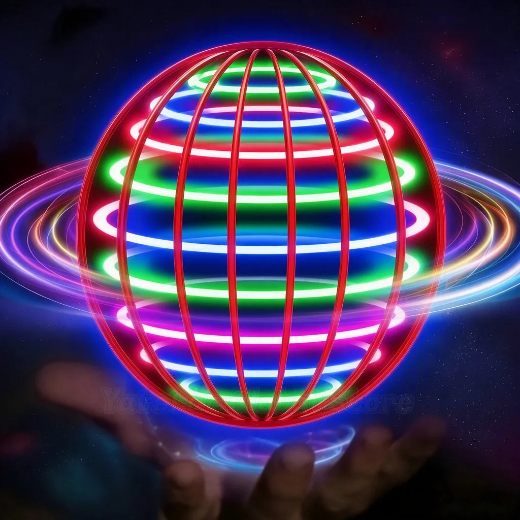 A hand is holding a glowing, spherical LED ball that emits vibrant light rings and stripes.