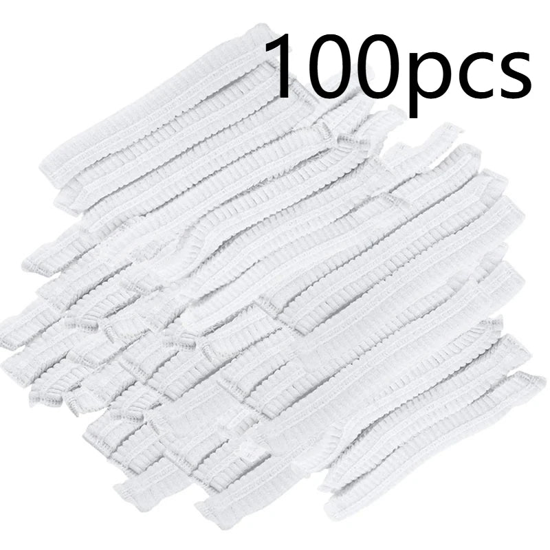 A pile of 100 disposable white broom covers for dust and hair removal.