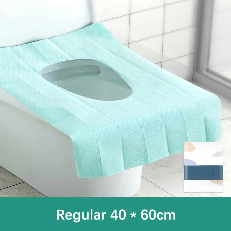 Light blue disposable toilet seat cover for a toilet, measuring 40 by 60 cm.