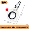 A white fluorescent zip tie organizer with a metal clip is shown against a white background.