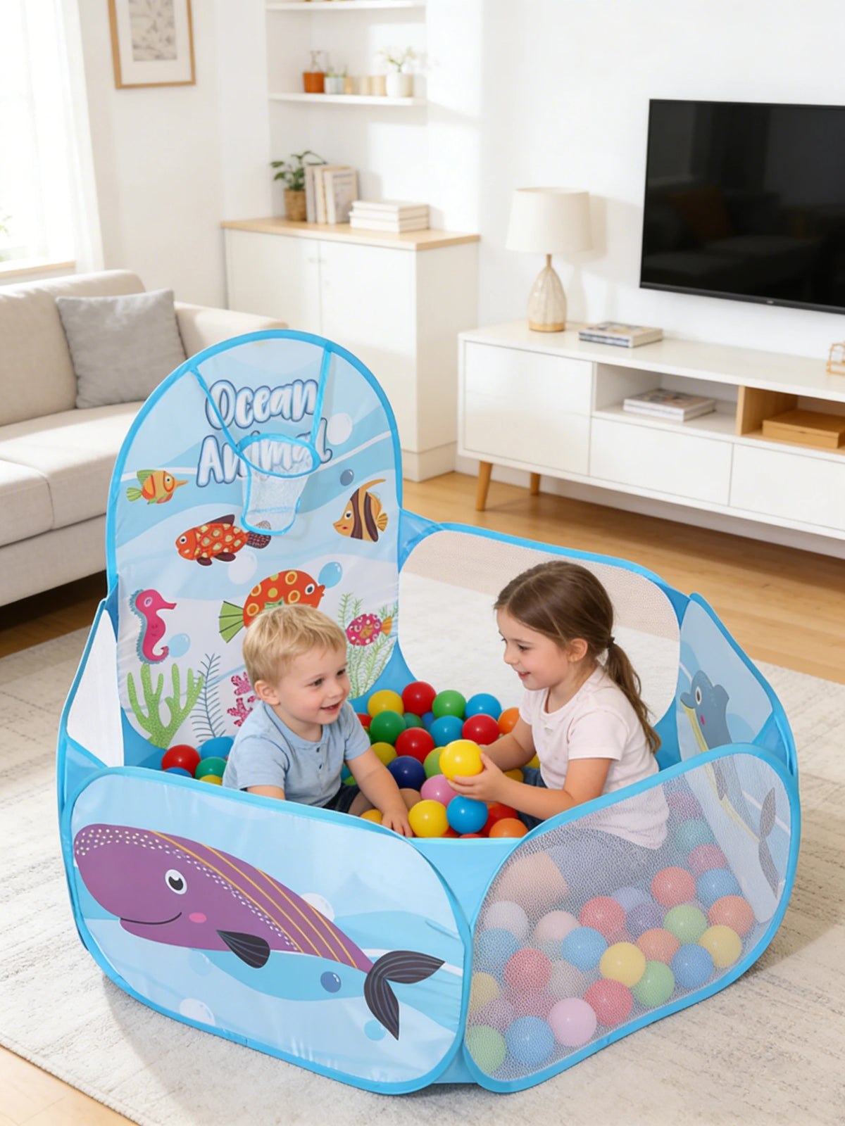 A blue and green foldable ball pit with a basketball hoop for children's indoor or outdoor play.
