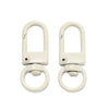 A pair of light beige alloy lobster clasp hooks for DIY jewelry making.