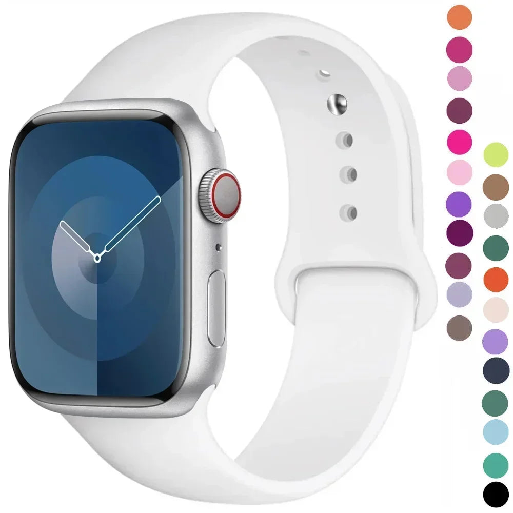 A white silicone sport band for an Apple Watch shown with various color options.