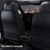 Interior view of a car showing black PU leather seat covers and dashboard.