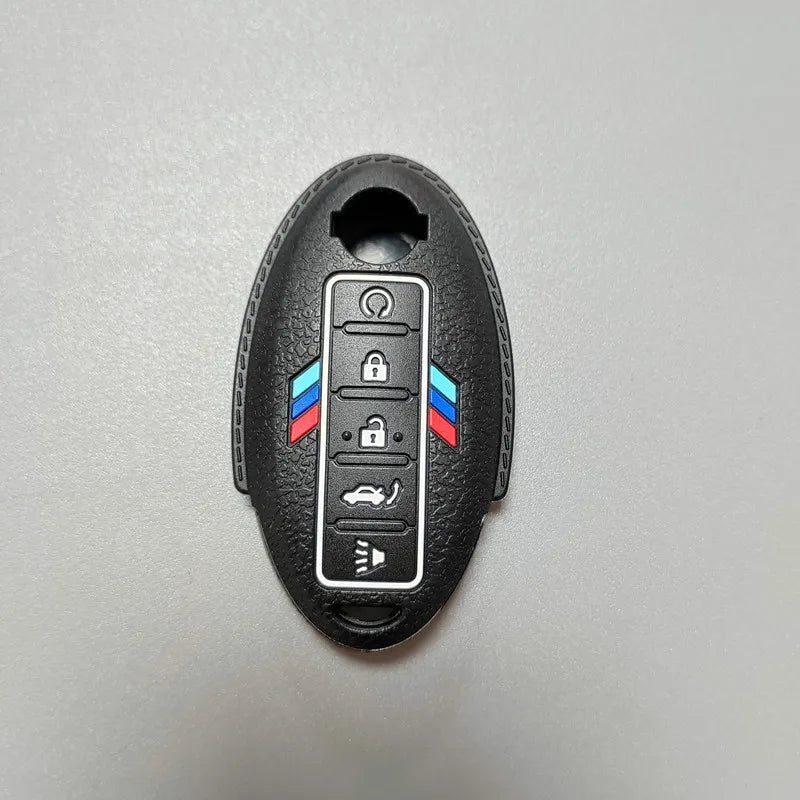 Black silicone key fob cover with a slot for a car key and indicators for door locks and trunk.