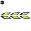 A set of six yellow reflective carbon fiber car styling strips.