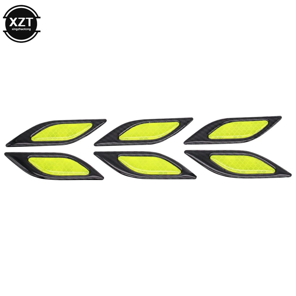 A set of six yellow reflective carbon fiber car styling strips.