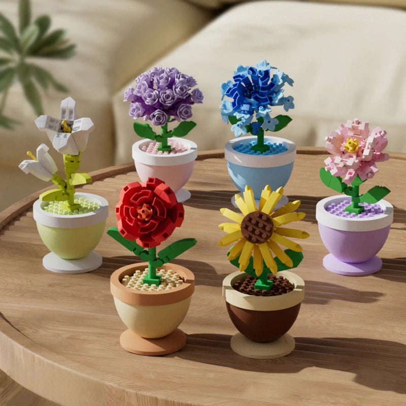 A set of creative flower pot building blocks featuring roses, sunflowers, and carnations in various colors.