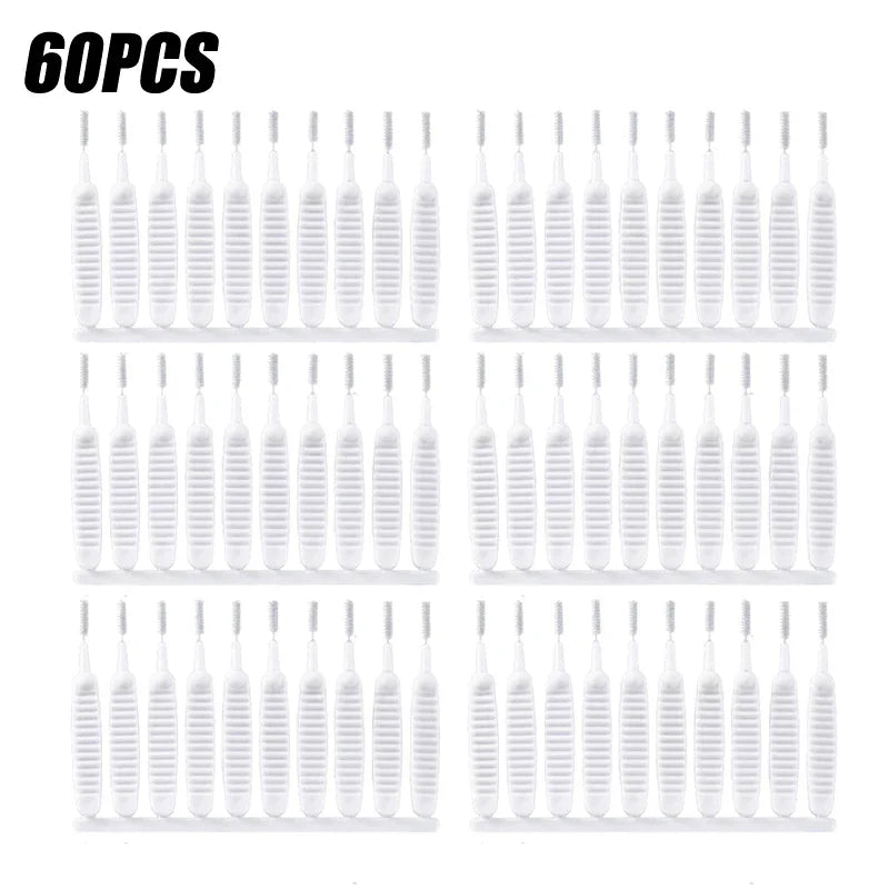 A set of 60 plastic shower cleaning brushes with nozzles for unclogging.