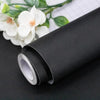 Roll of self-adhesive matte green vinyl film for furniture and wall renovation