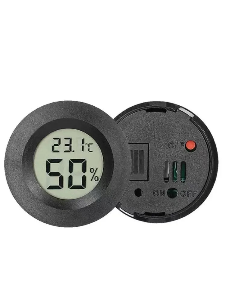 A black mini digital hygrometer thermometer with an LCD display showing 23.1°C and 50% humidity.