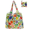 A colorful floral shopping tote bag with a matching fabric carry pouch featuring various fruits and vegetables.