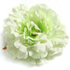 A cluster of pale green and white silk peony flower heads for crafting and decoration.