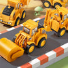 A set of yellow diecast construction vehicles, including a push-play excavator and bulldozer, displayed on a gray surface.