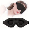 A black 3D contoured silk-touch sleep mask is shown being worn by a person, with the product lying flat below.