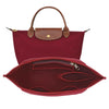 A deep burgundy felt purse organizer insert designed to fit large tote bags.