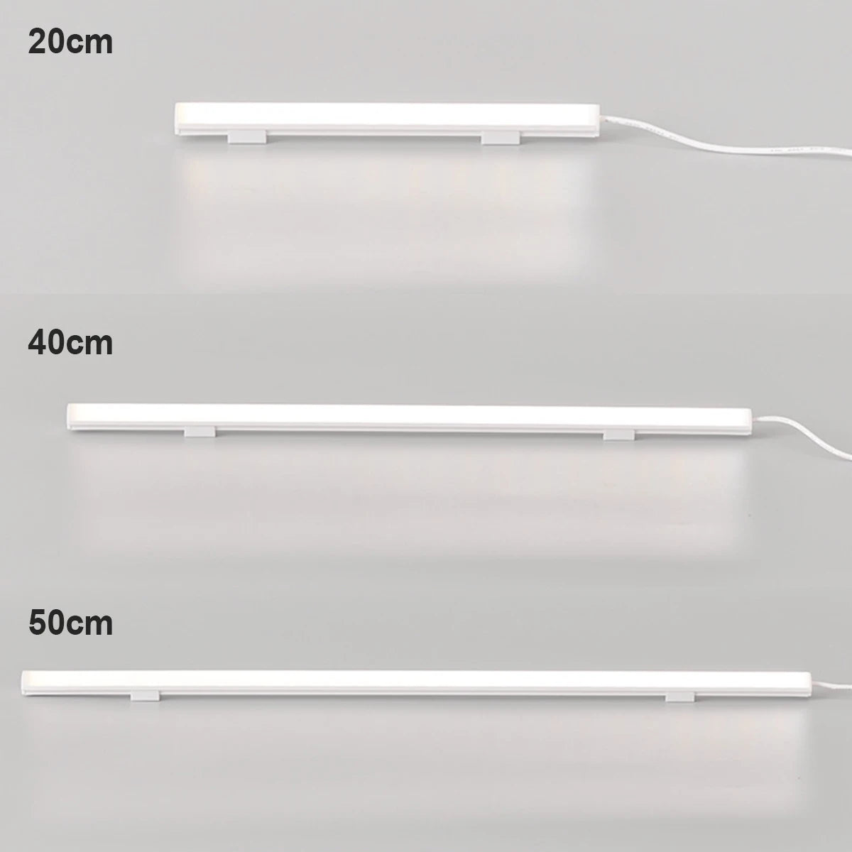 A series of white LED light bars of varying lengths (20cm, 40cm, and 50cm) shown illuminating a surface.