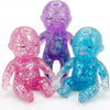 Three glitter squishy silicone figures in pink, purple, and blue for stress relief and fidgeting