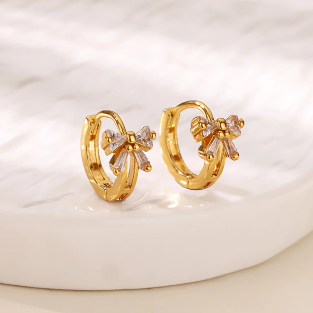 Boucles d'oreilles créoles en zircon cubique ton or