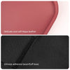A close-up view of a pink Napa leather armrest mat and a black silicone adhesive base with fluff base.