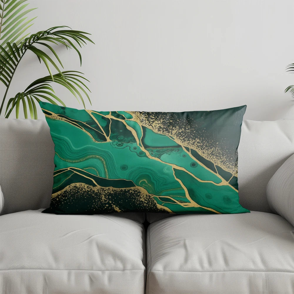 A decorative pillowcase featuring a modern geometric pattern of teal and gold marbled lines.