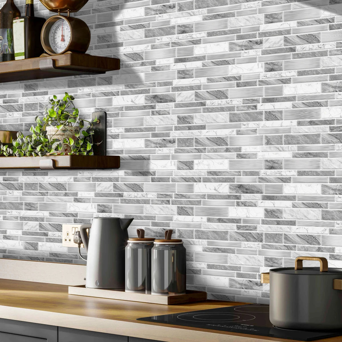 A kitchen backsplash featuring gray and white marble tile stickers above a wooden countertop.