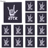 A set of ten black embroidered iron-on patches featuring a hand sign and the word ROCK.