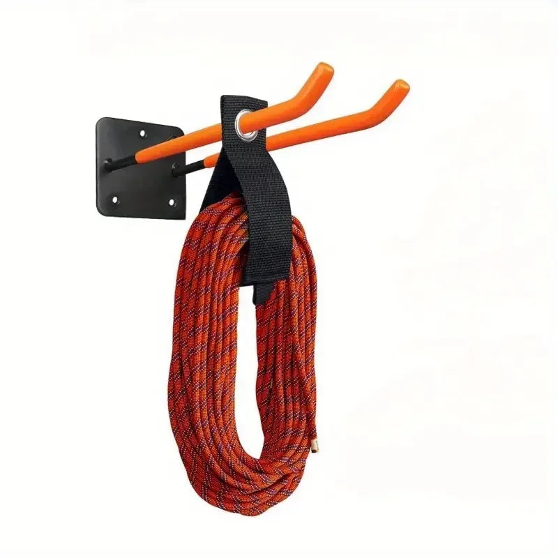 Heavy-duty orange and black coiled hook for garage storage of garden tools