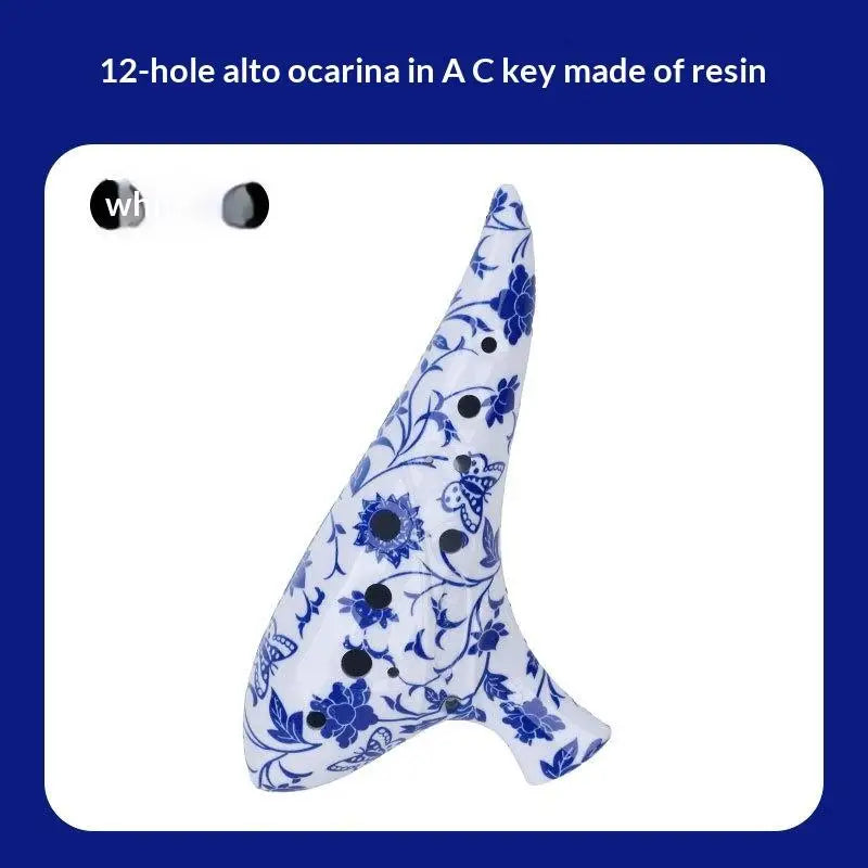 A white ocarina in A key made of resin featuring a floral pattern.