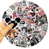 A hand holds a circular collage of Y2K retro graffiti stickers for laptops, phones, and luggage.