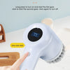 A hand is operating a blue cordless electric spin scrubber with a brush head on a white countertop.