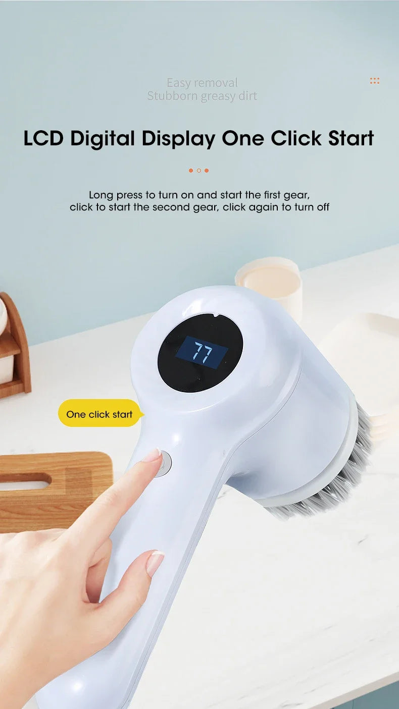 A hand is operating a blue cordless electric spin scrubber with a brush head on a white countertop.