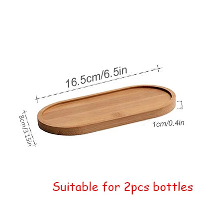 A wooden soap dispenser bottle with dimensions 16.5cm/6.5in, suitable for two bottles.