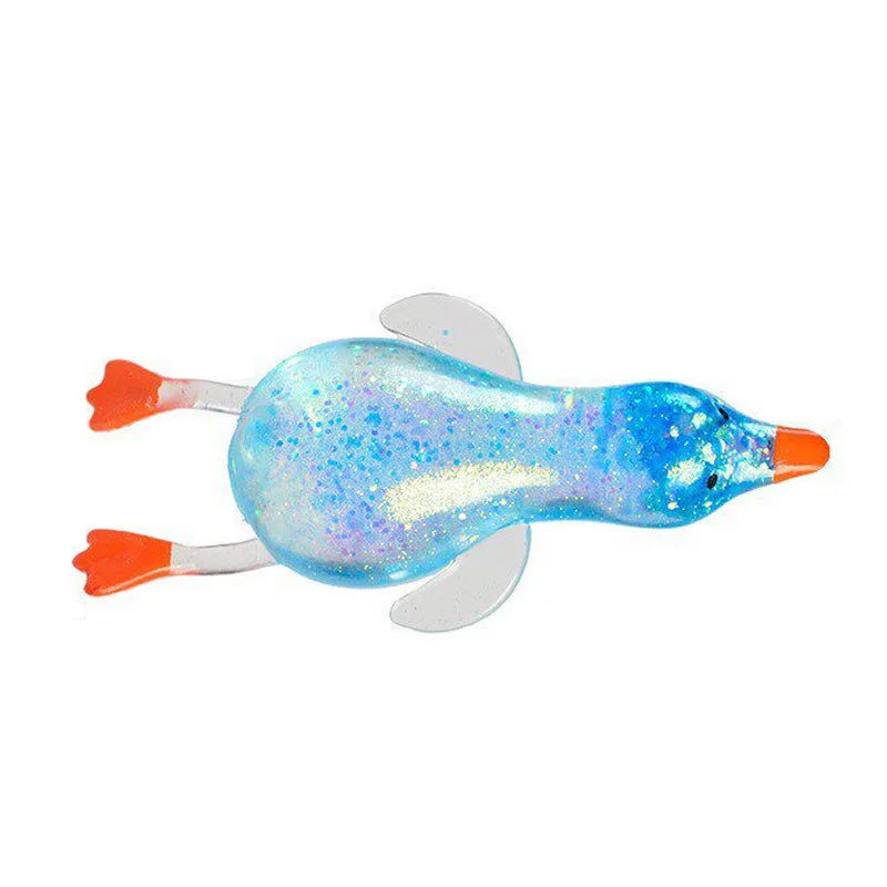 Helles blaues Glitzer-Entschlaffungsspielzeug-Enten-Kuscheltier mit orangefarbenen Akzenten.