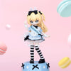 A blonde anime-style collectible figurine with black hair and a white dress featuring stripes and bows.