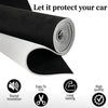 Rolls of black and white suede car headliner fabric with foam backing for interior repair
